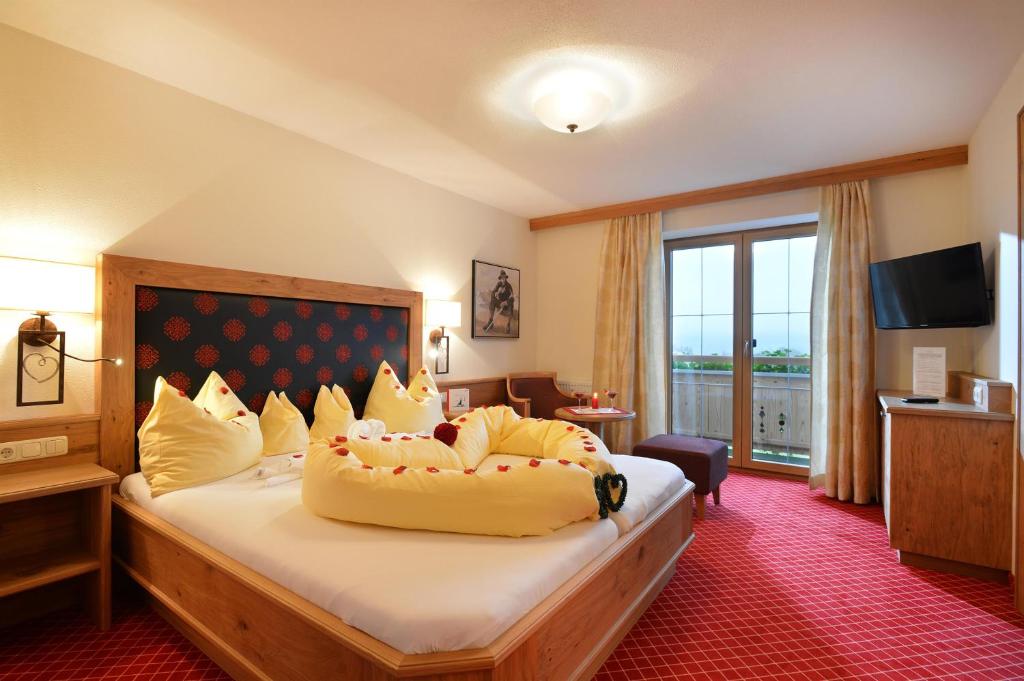 Voodi või voodid majutusasutuse Hotel Garni Bavaria toas