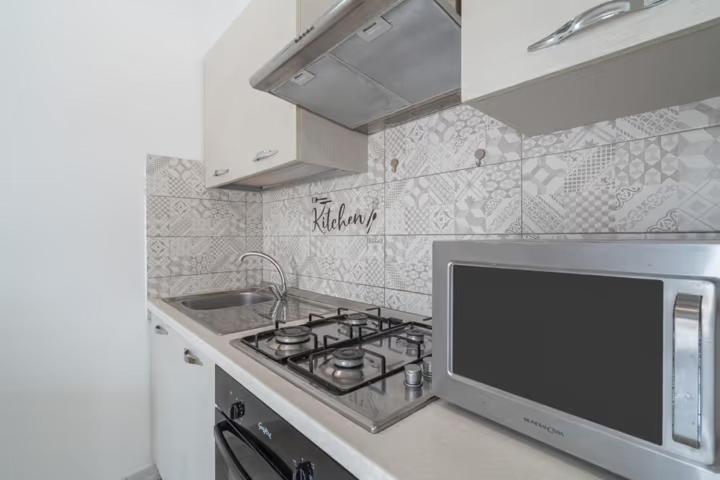 Kuchyň nebo kuchyňský kout v ubytování SFEA HOME