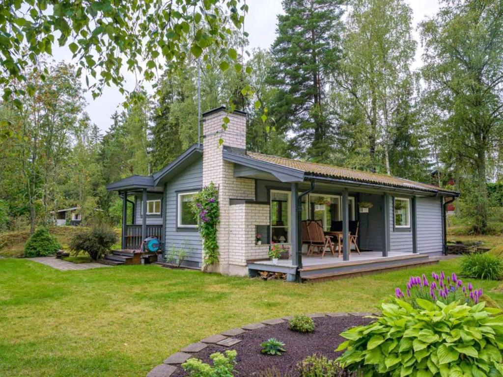 a tiny house in the middle of a yard at 4 star holiday home in Sparreholm in Sparreholm