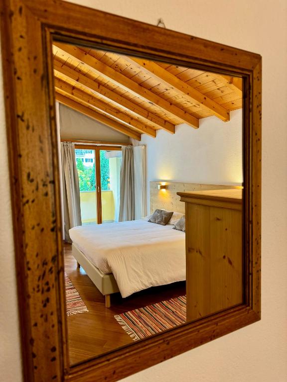 Postel nebo postele na pokoji v ubytování La Rosa Home