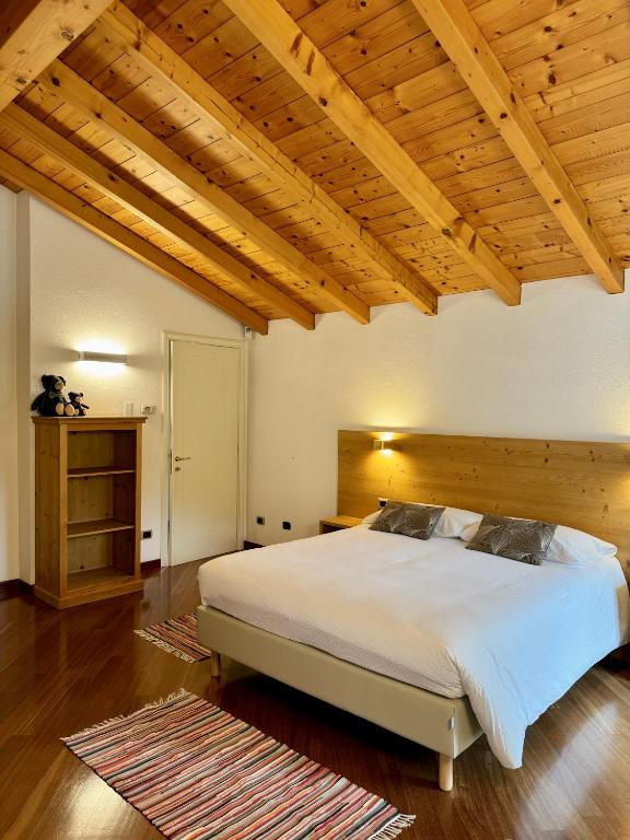 Postel nebo postele na pokoji v ubytování La Rosa Home