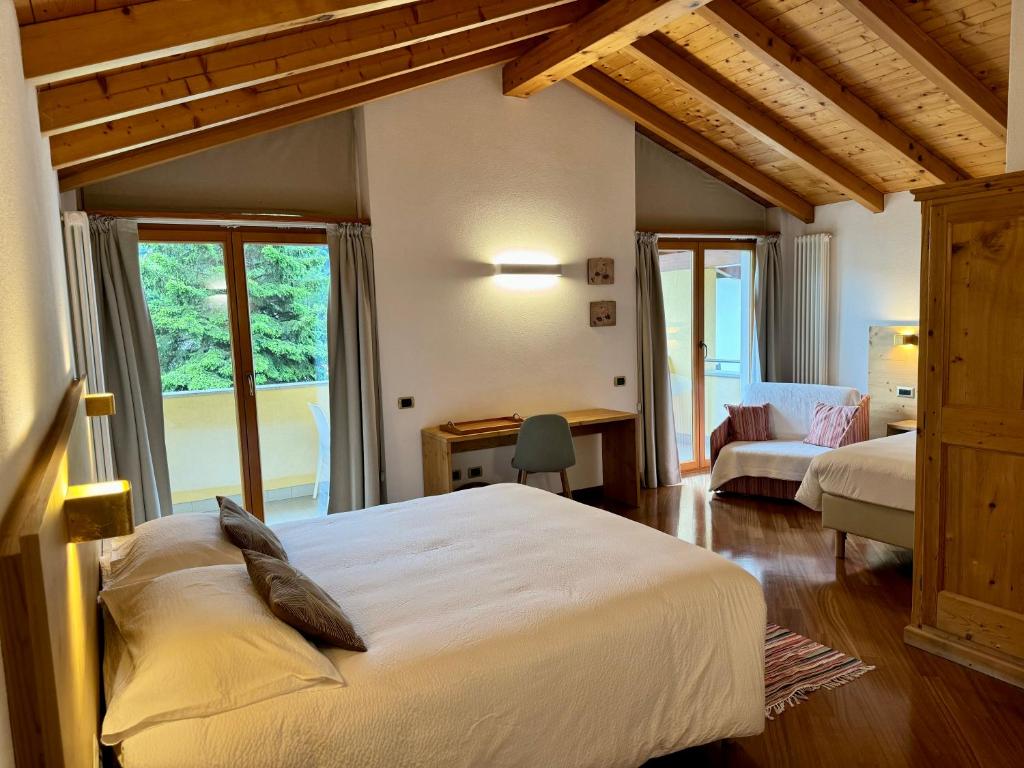 Postel nebo postele na pokoji v ubytování La Rosa Home