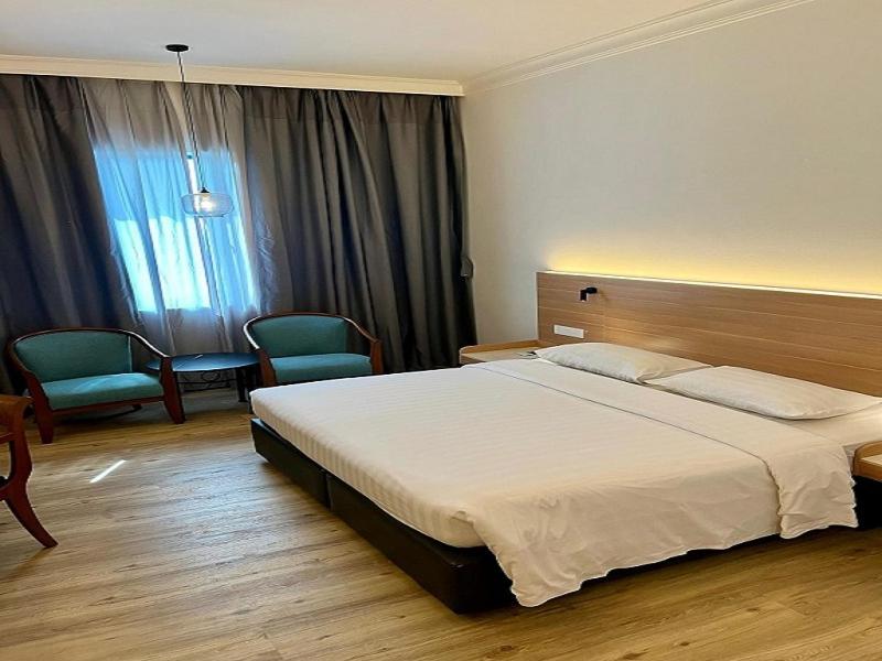 Postel nebo postele na pokoji v ubytování Crystal Crown Hotel Harbour View, Port Klang