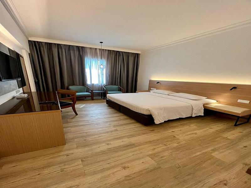 Postel nebo postele na pokoji v ubytování Crystal Crown Hotel Harbour View, Port Klang