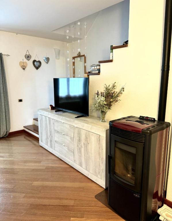 TV a/nebo společenská místnost v ubytování La Rosa Home