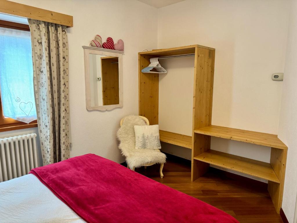 Postel nebo postele na pokoji v ubytování La Rosa Home