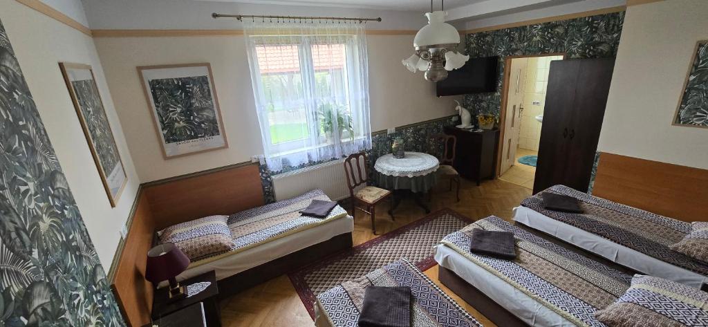 Postel nebo postele na pokoji v ubytování Willa Aida