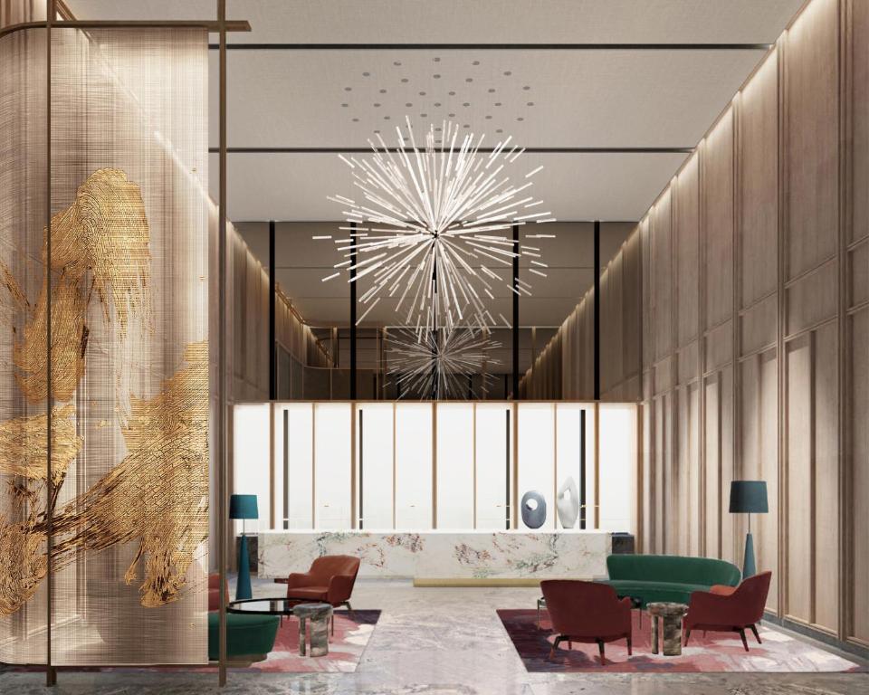 a rendering of a lobby with chairs and a table at Park Hyatt Changsha in Changsha