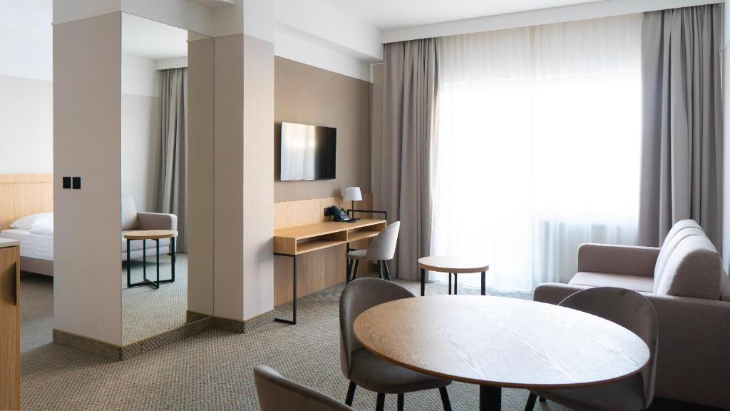 Postel nebo postele na pokoji v ubytování Hotel Continental