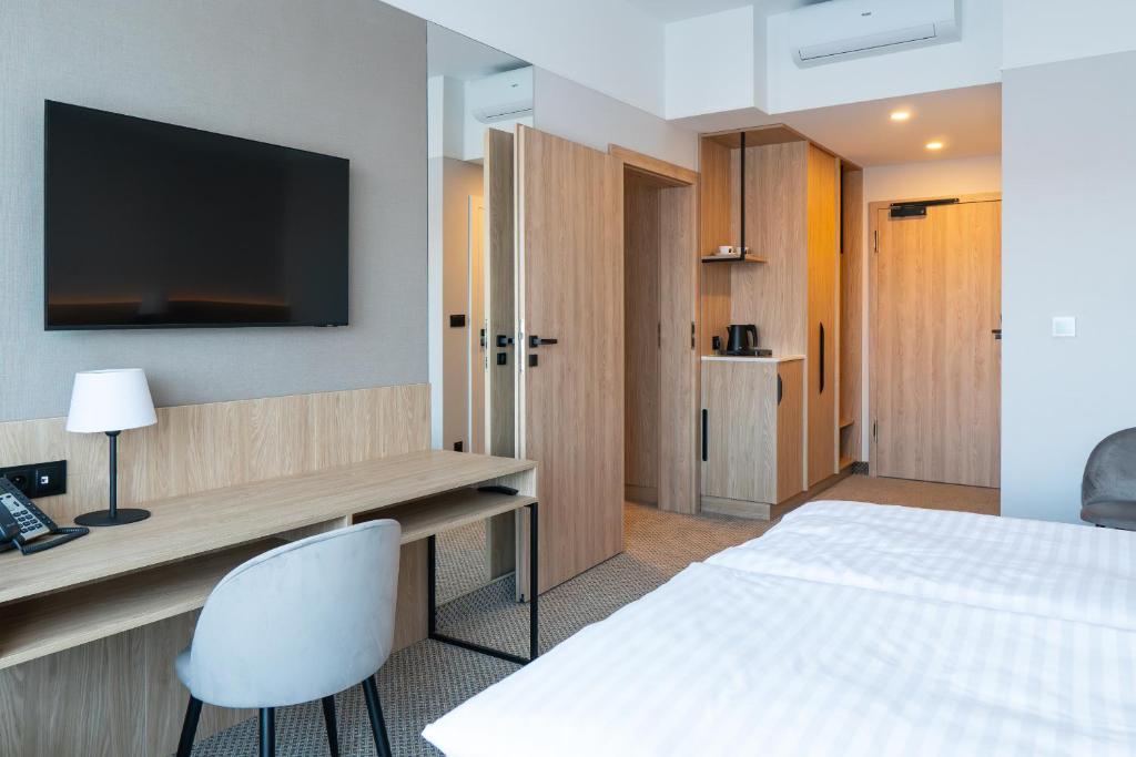 Postel nebo postele na pokoji v ubytování Hotel Continental