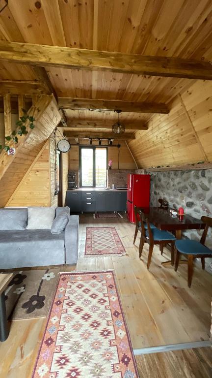 Posezení v ubytování AURA Cottages