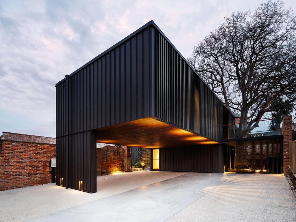 an external view of a black building at The Conservatory in Hobart