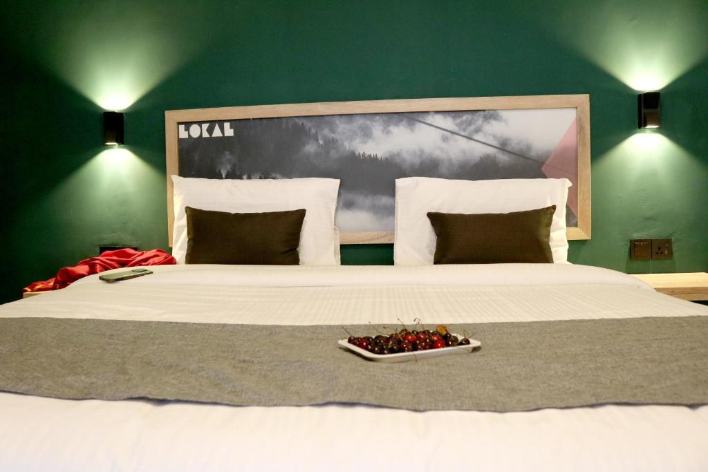 Ένα ή περισσότερα κρεβάτια σε δωμάτιο στο Lokal Rooms X Naran Kunhar River