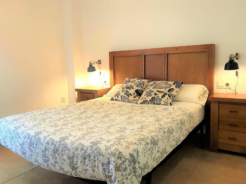A bed or beds in a room at Apartamento En El Centro De Ronda