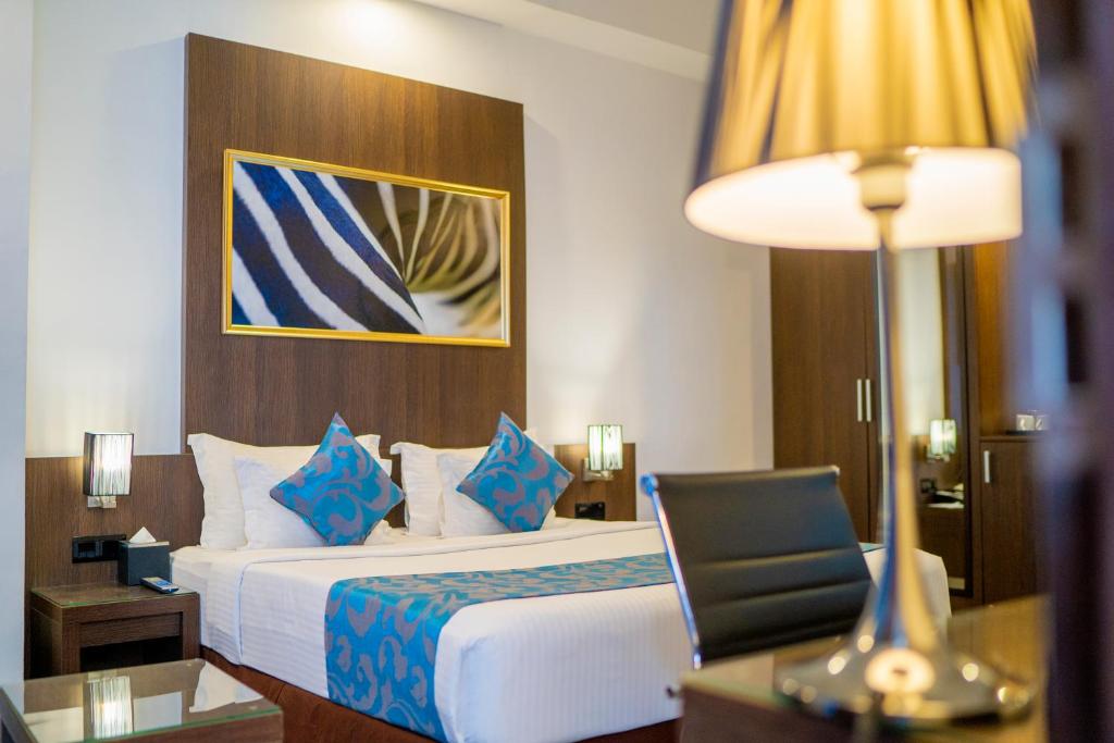 Postel nebo postele na pokoji v ubytování Best Western Elyon Colombo