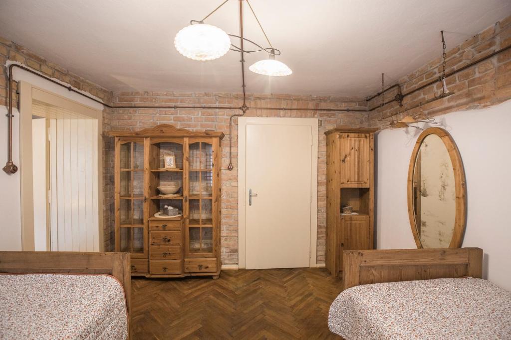 Postel nebo postele na pokoji v ubytování Chalupa pod Řípem