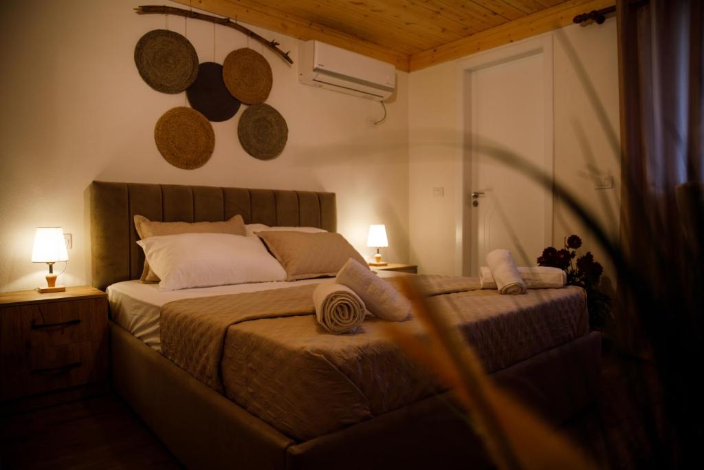 Postel nebo postele na pokoji v ubytování Guva Guest House
