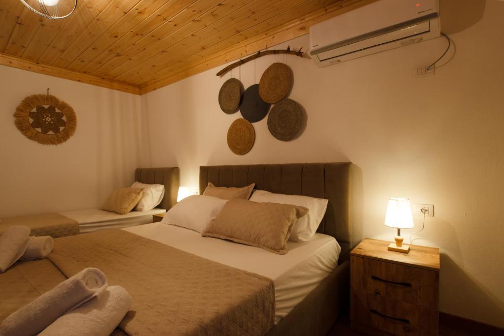 Postel nebo postele na pokoji v ubytování Guva Guest House