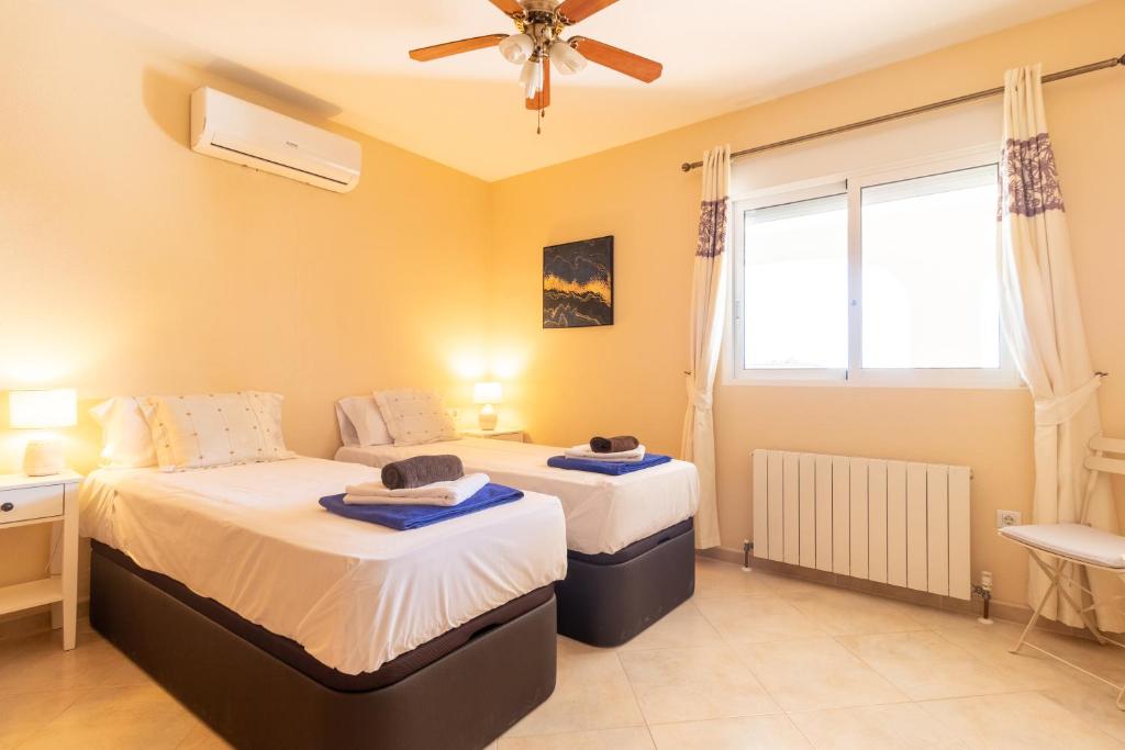 Postel nebo postele na pokoji v ubytování Casa Julia