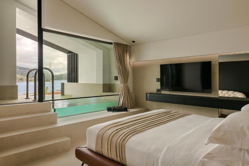 Postel nebo postele na pokoji v ubytování Casaly Hotel & Spa