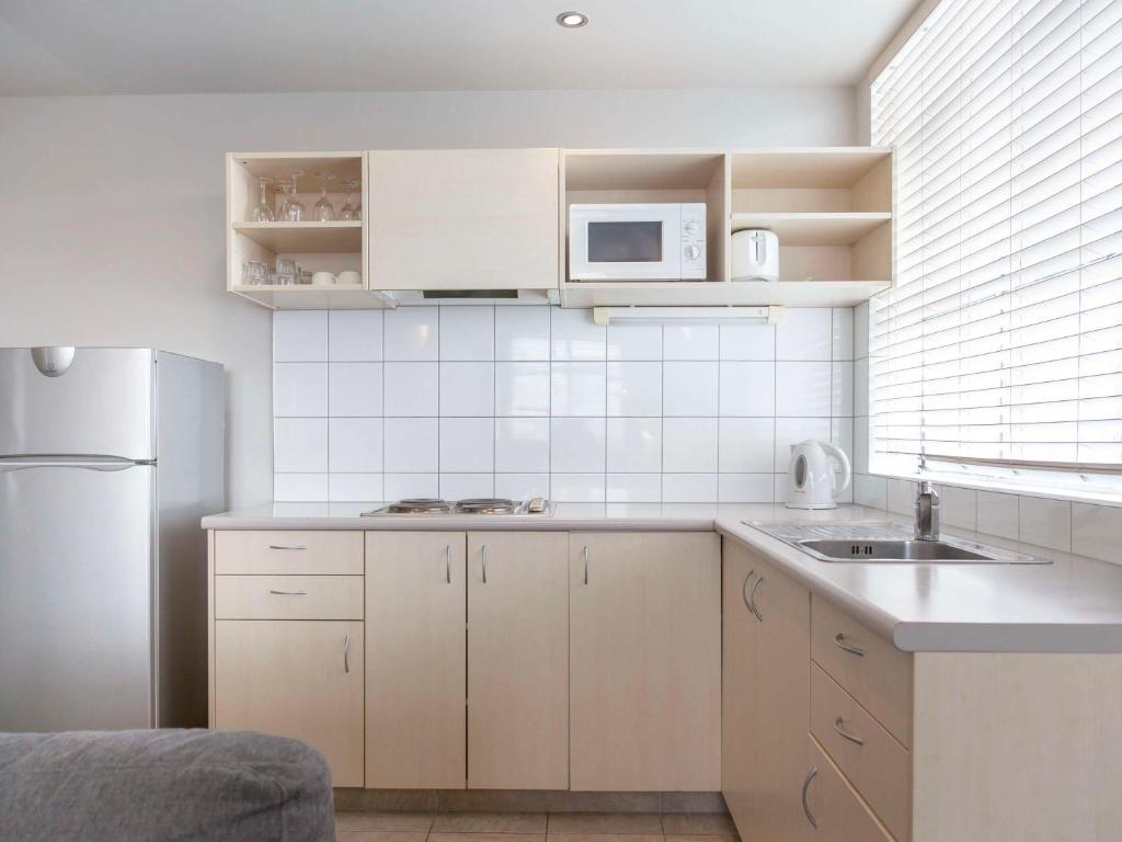 Kuchyň nebo kuchyňský kout v ubytování Ibis Styles Invercargill