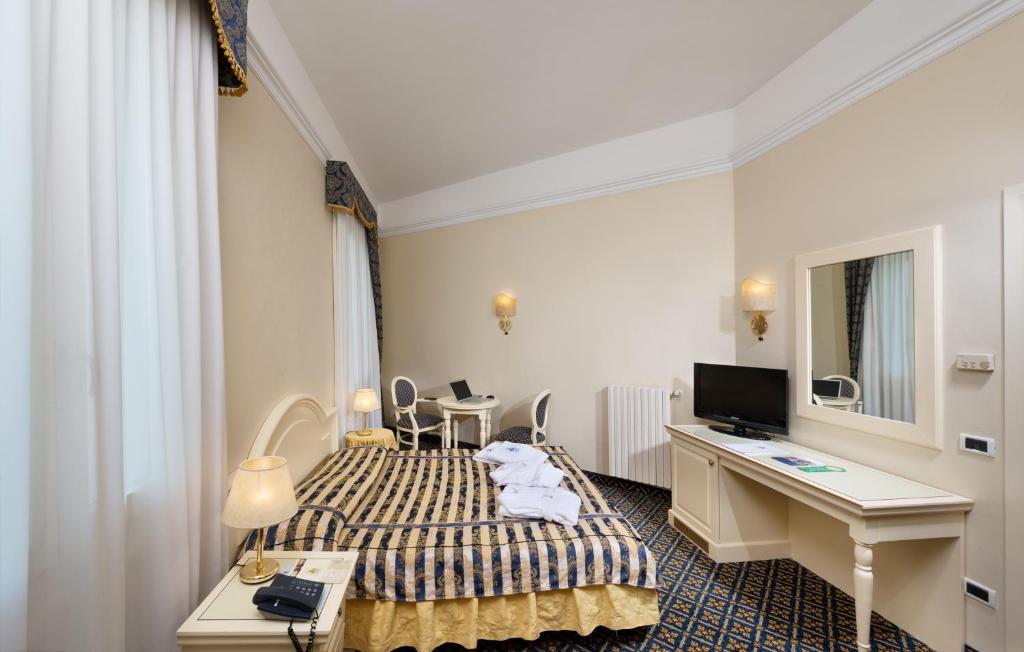 TV a/nebo společenská místnost v ubytování Hotel Terme Roma
