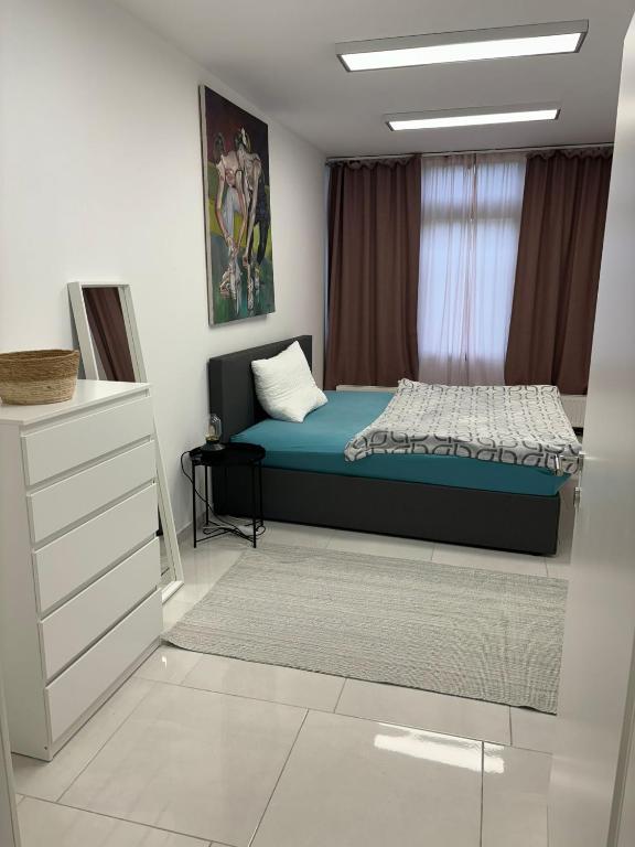 Posteľ alebo postele v izbe v ubytovaní Stadtsuite mit Sauna in Wiener Neustadt 135 m2