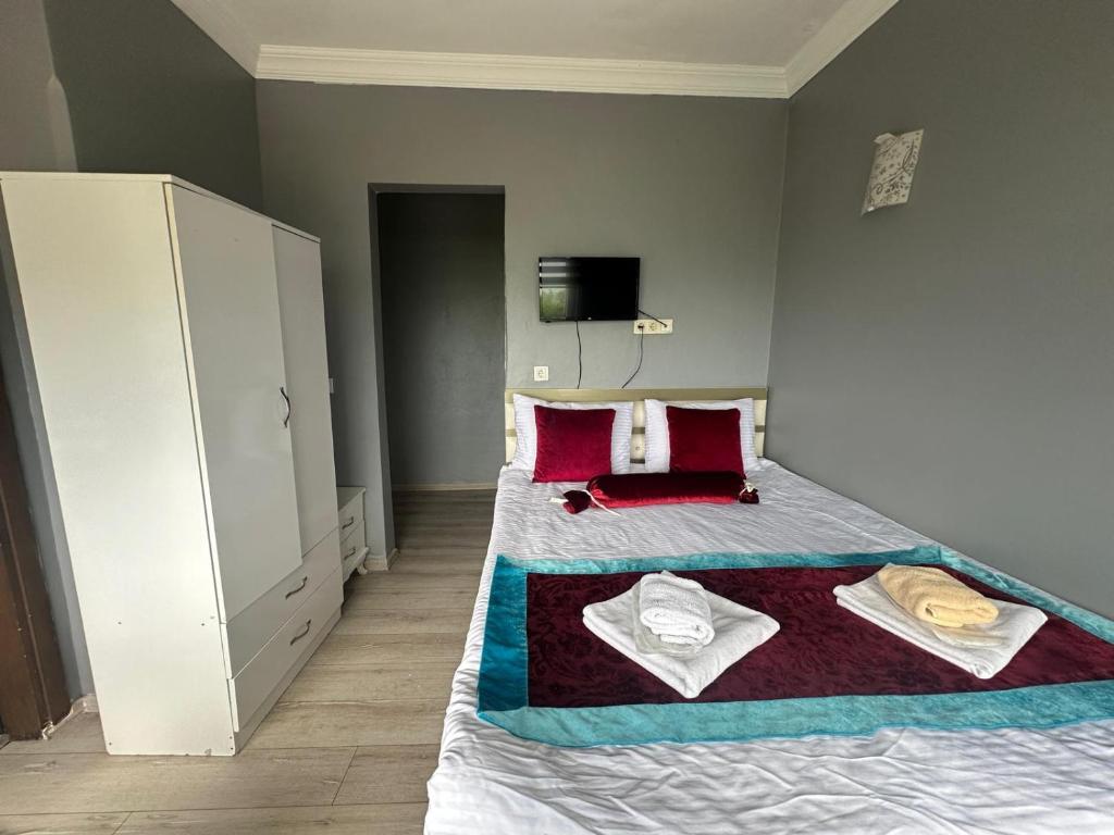 Postel nebo postele na pokoji v ubytování Happy Suite Boutique Hotel