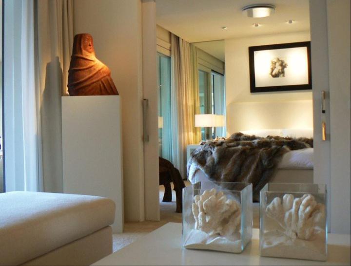 a bedroom with a bed and a table in a room at casagratia in Taormina