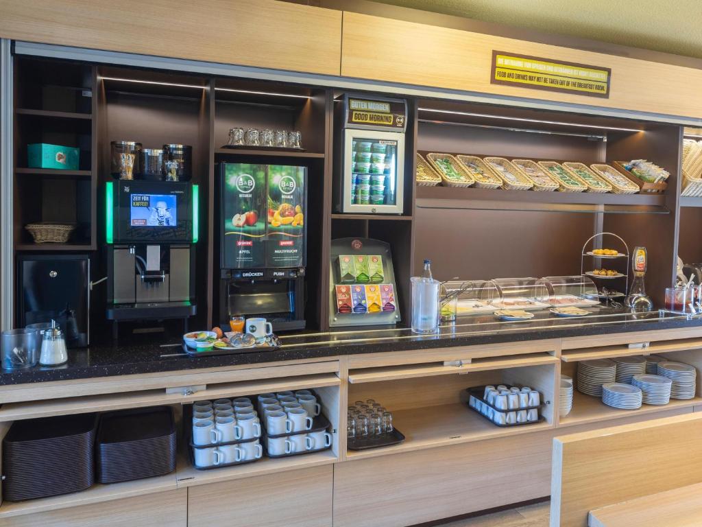 Kuchyň nebo kuchyňský kout v ubytování B&B Hotel Leipzig-Nord