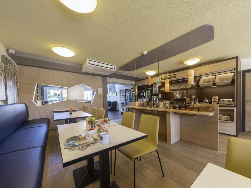 Kuchyň nebo kuchyňský kout v ubytování B&B Hotel Leipzig-Nord