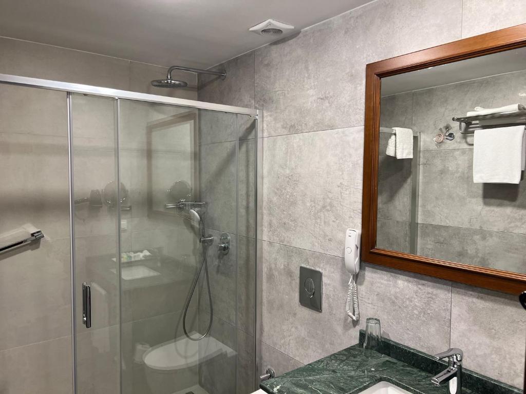 Koupelna v ubytování GLK PREMIER The Home Suites & Spa