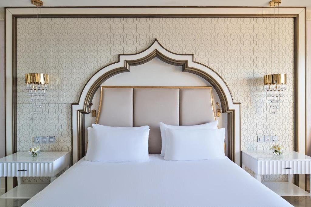 Postel nebo postele na pokoji v ubytování Rixos Premium Saadiyat Island - All Inclusive