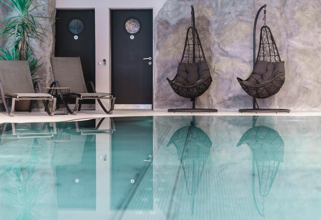 Bazén v ubytovaní Genusshotel Fichtenhof alebo v jeho blízkosti
