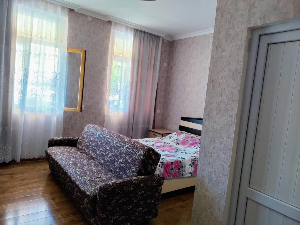 Postel nebo postele na pokoji v ubytování Jibghashvilebi's house