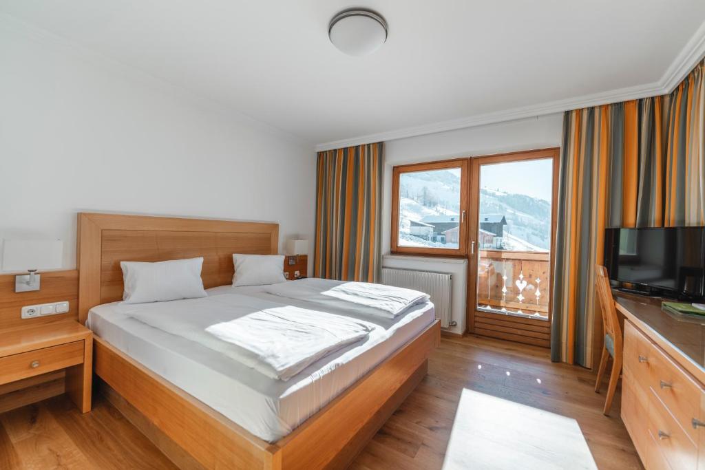 Posteľ alebo postele v izbe v ubytovaní Genusshotel Fichtenhof