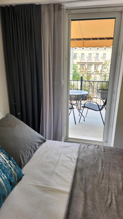 Postel nebo postele na pokoji v ubytování Scaletta Rooms
