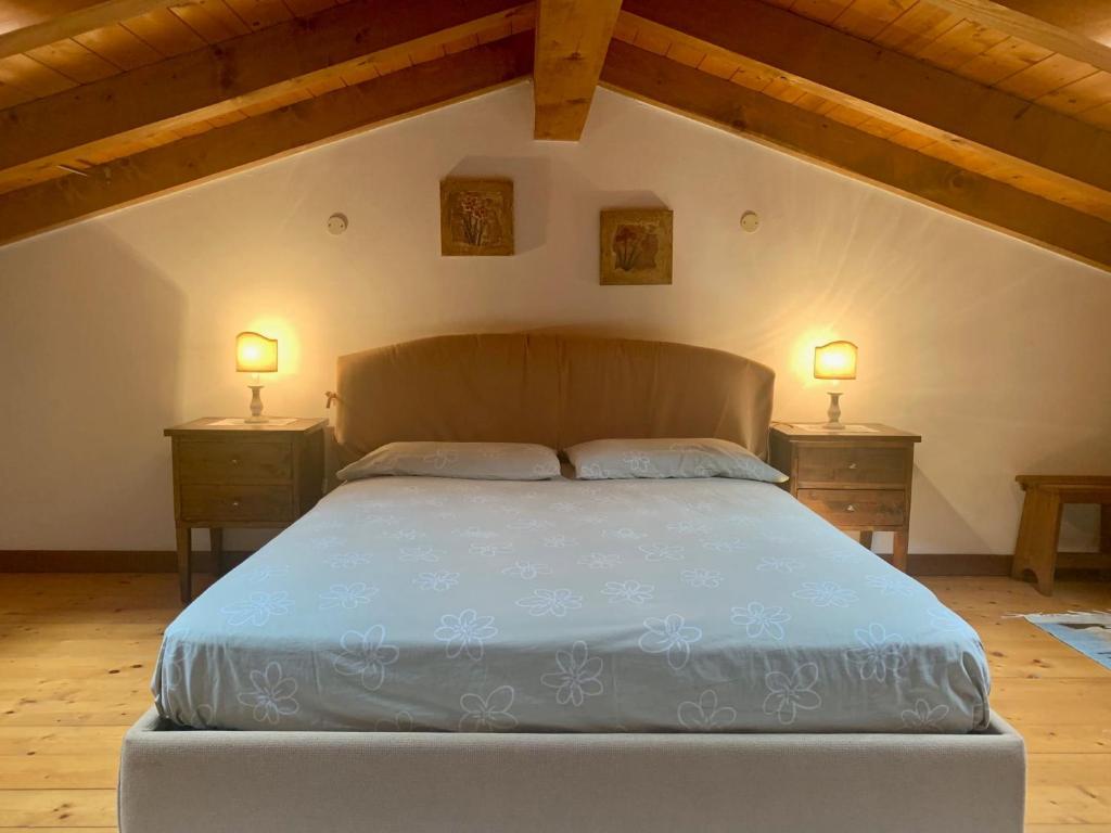 Postel nebo postele na pokoji v ubytování Residenza Fornaro