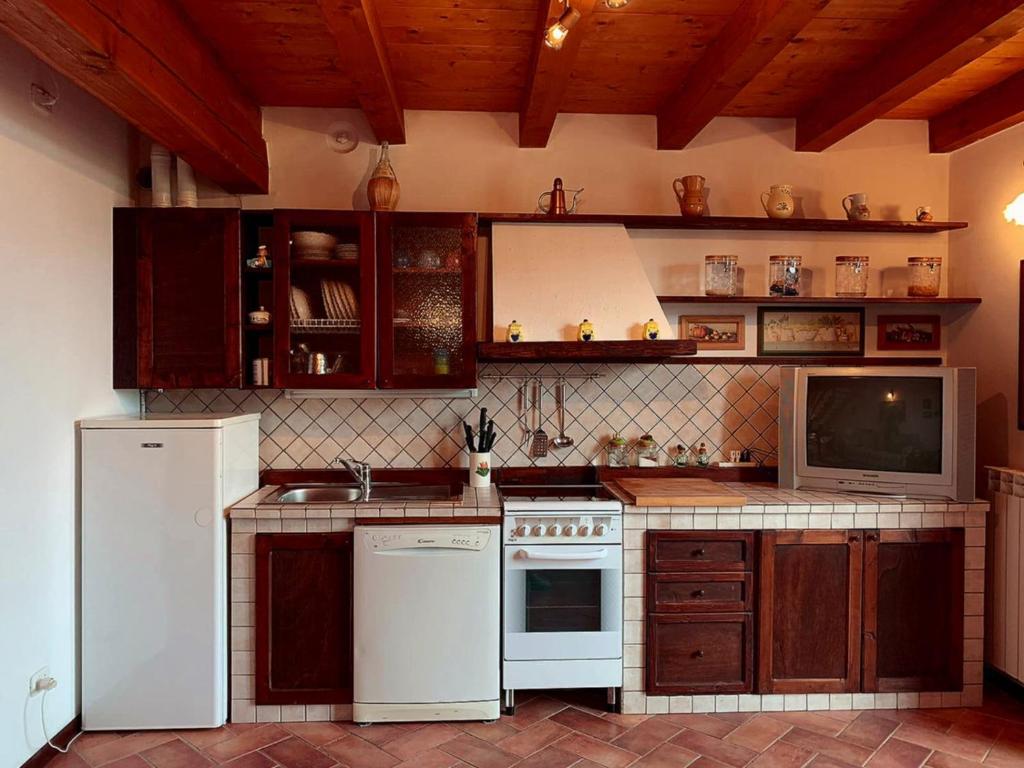 Kuchyň nebo kuchyňský kout v ubytování Residenza Fornaro