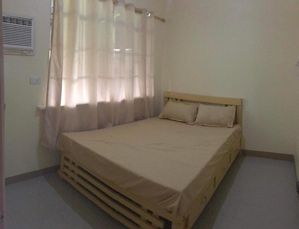 Ένα ή περισσότερα κρεβάτια σε δωμάτιο στο Accessible Tiny home for travelers with fresh air