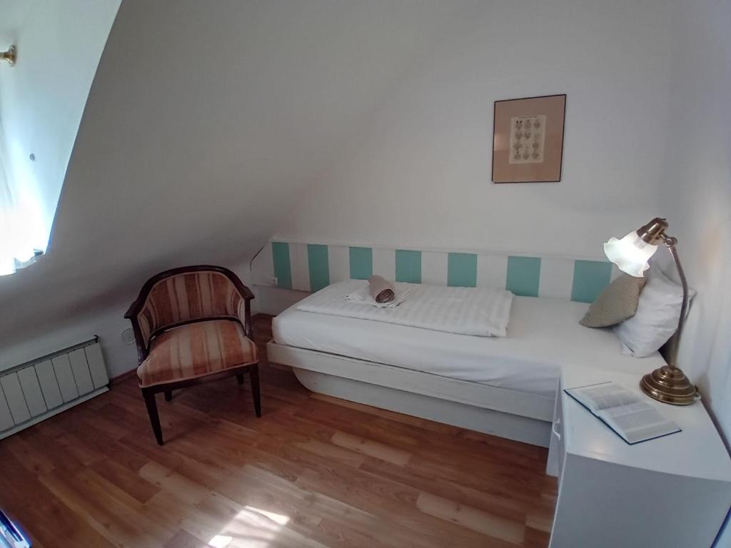 Postel nebo postele na pokoji v ubytování Senator Ház