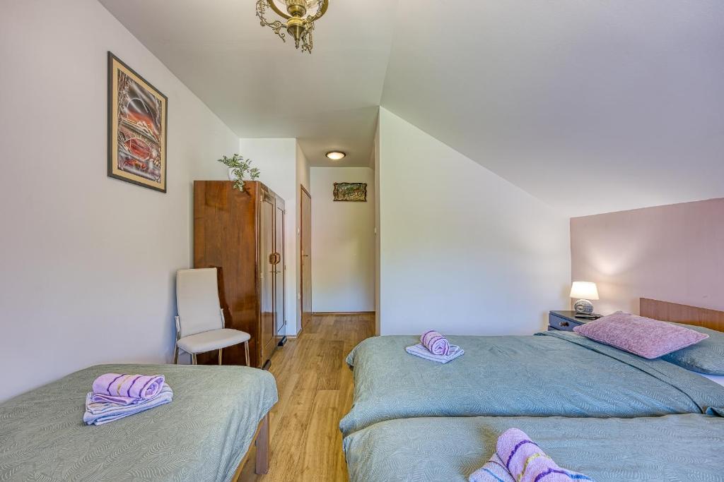 Postel nebo postele na pokoji v ubytování Rooms Centar