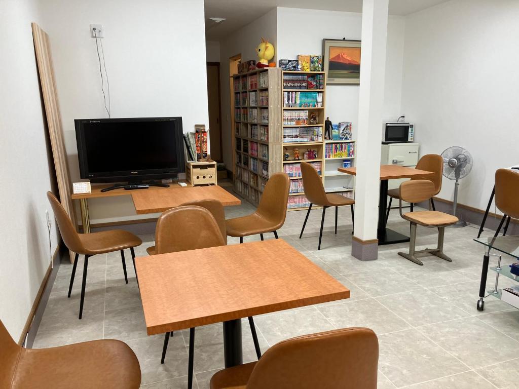 TV a/nebo společenská místnost v ubytování わがらん家 -えんつなぎ-