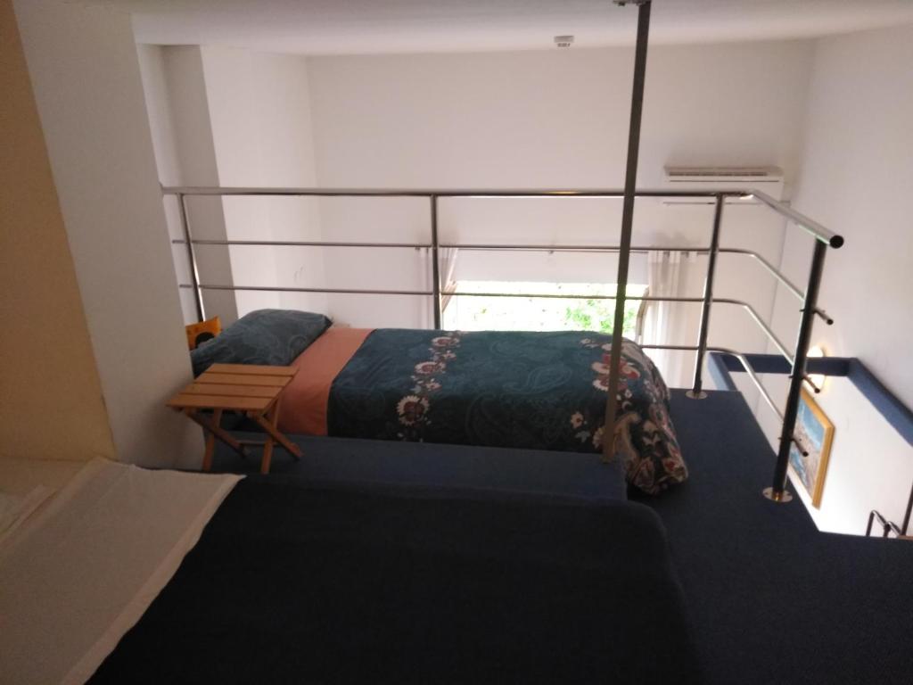 Postel nebo postele na pokoji v ubytování Central Residence