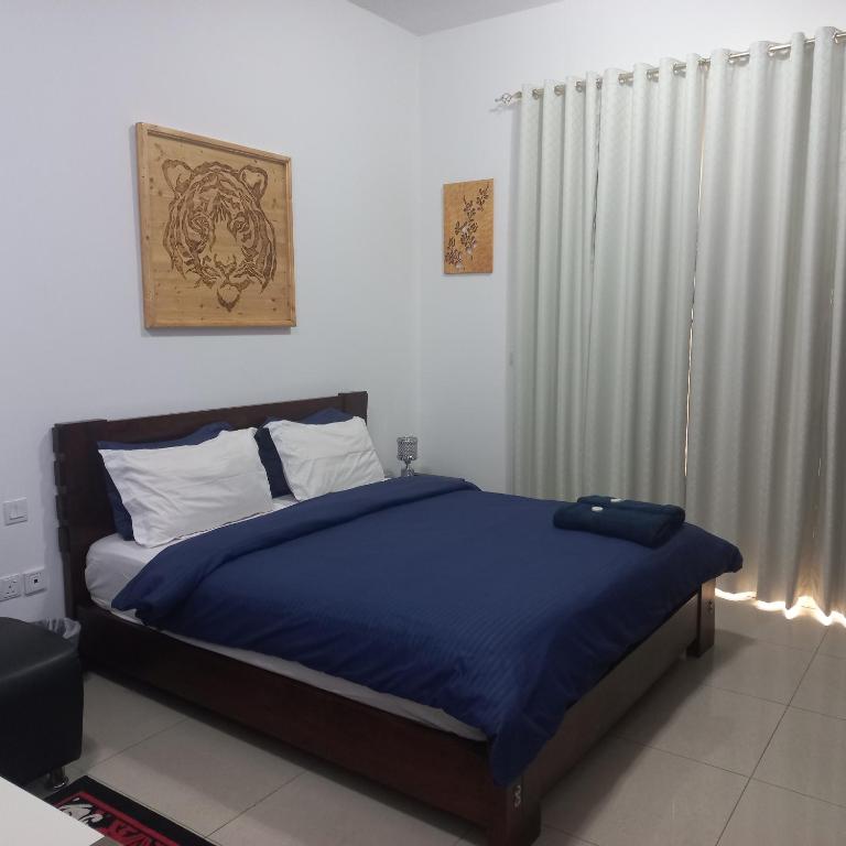 Postel nebo postele na pokoji v ubytování Sea View Studio 1 Royal Breeze