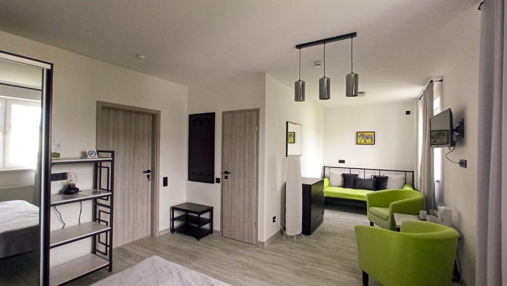 Postel nebo postele na pokoji v ubytování LOFT HOUSE