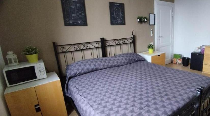 Łóżko lub łóżka w pokoju w obiekcie Casa Lambruschini