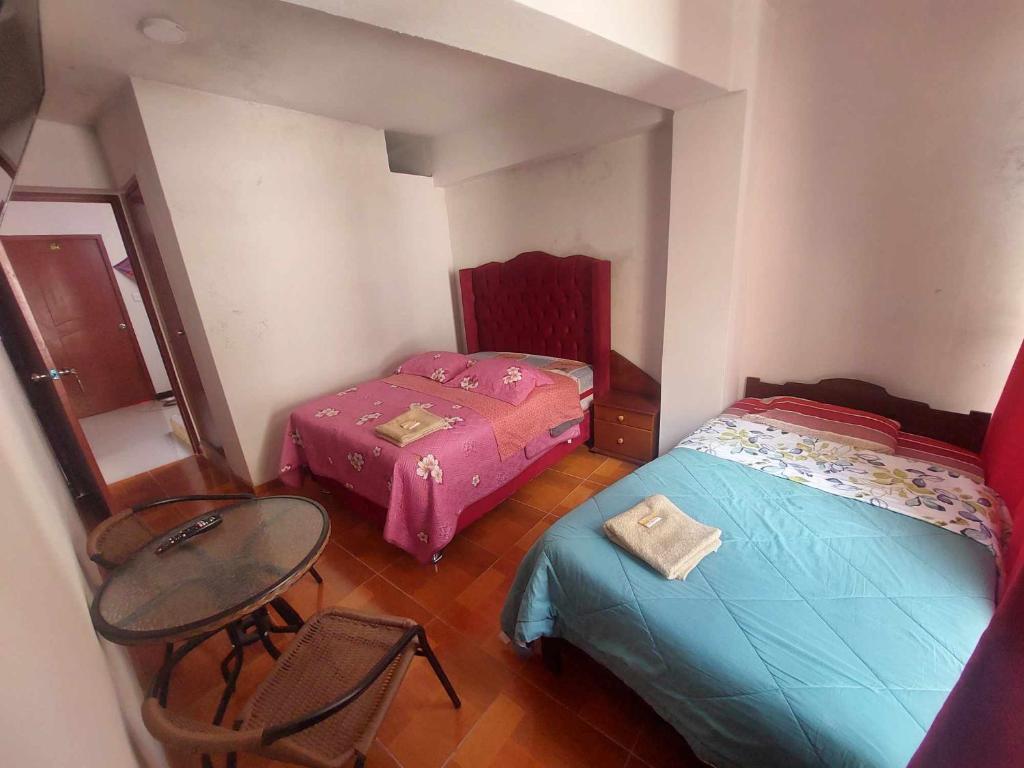 Ένα ή περισσότερα κρεβάτια σε δωμάτιο στο Mi Sr. Cautivo