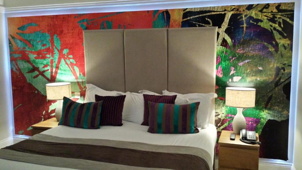 Кровать или кровати в номере Remont Oxford Hotel
