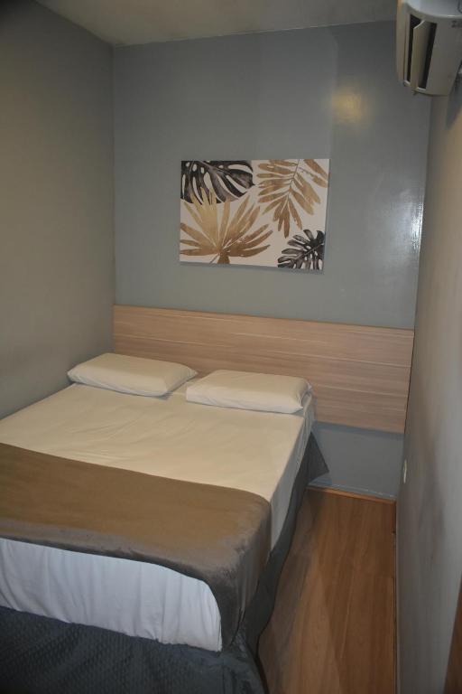 Posteľ alebo postele v izbe v ubytovaní Unity Hotel - Votorantim - SP
